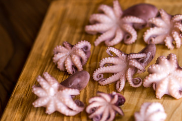 Octopus on the table. Set for cooking. Diet