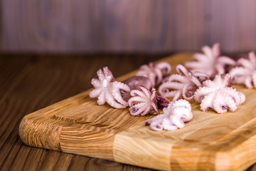 Octopus on the table. Set for cooking. Diet
