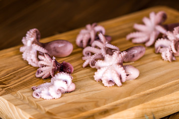 Octopus on the table. Set for cooking. Diet