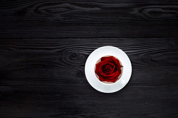 White cup on black table
