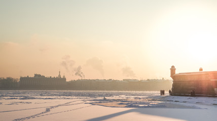 Winter cityscape with the sun, frost and fog. Saint Petersburg in January.
