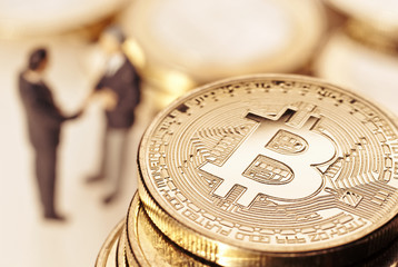 Bitcoin und Geschäftsmänner