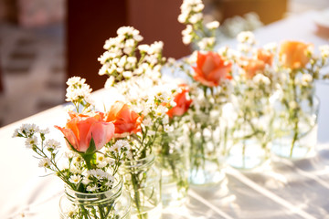 Floral arrangement with pink roses gypsophila