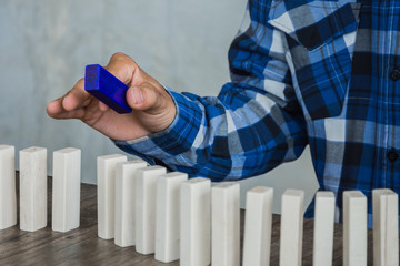 Businessman domino picked some out of the lineup.