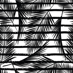 Fototapeta premium Seamless exotic pattern with palm leaves.