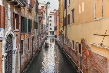 Fototapeta na wymiar Gondola in canal Venice, Italy