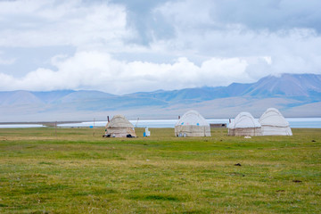 Fototapeta na wymiar Yurts by Song Kul Lake, Kyrgyzstan