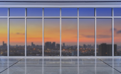 Glass wall in modern office building at sunrise with airplane