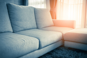 contemporary interior of Living room with part of sofa in sunny day and  interior background concept