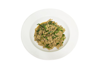 stir-fried pork and basil in white plate