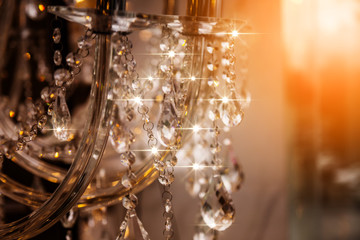 Chrystal chandelier close-up. Glamour background with copy space