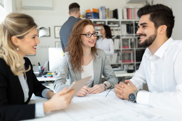 Team of architects working together on project