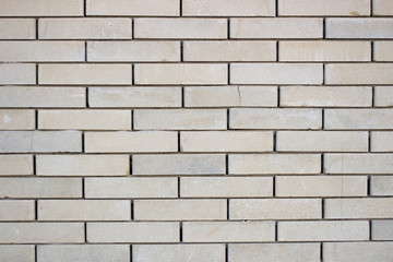 Yellow old brick wall background