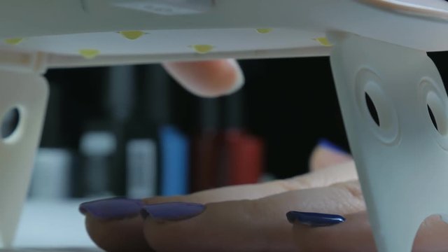 UV lamp gel polish manicure process in home conditions.