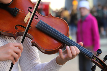 Street musician playing violin