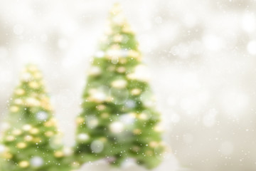 Blured Christmas tree on bokeh abstract background