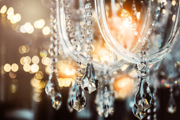 Chrystal chandelier close-up. Glamour background with copy space - obrazy, fototapety, plakaty