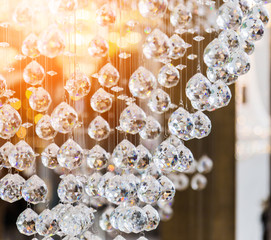 Chrystal chandelier close-up. Glamour background with copy space
