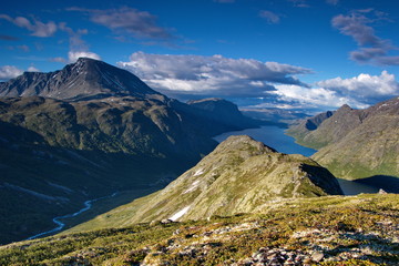 Gjende lake and norwegian mountains in summertime