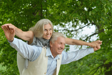  caucasian senior couple  in the park