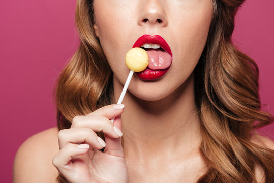 Cropped photo of woman lick lollipop isolated