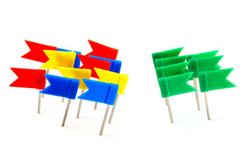 antagonism concept made from marking flag pins on white background