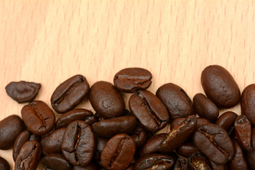 Closeup of Roasted Coffee Beans on Office Table in morning