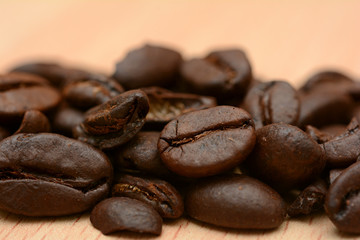 Closeup of Roasted Coffee Beans on Office Table in morning
