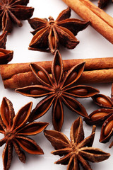 cinnamon stick and star anise spice on white background.