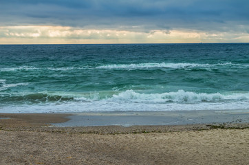 Fototapeta na wymiar Colorful seascape with the empty beach
