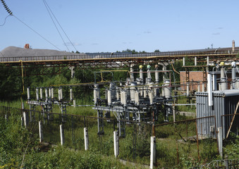 high-voltage power lines . electricity distribution station .