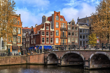 Fototapeta na wymiar Traditional old buildings in Amsterdam.