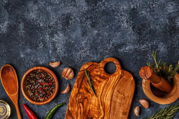 Cutting board and spice for cooking.
