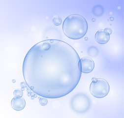 Vector shiny transparent soapp bubbles on light blue background