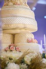 White wedding cake with flower decorate