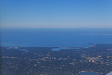 View from the airplane window, New York view of the ocean and also the coast from the altitude of the aircraft