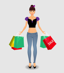 woman in jeance and top holding colored shopping bags