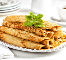 Pile of delicious filled sweet crepes