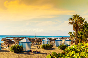 Beautiful sunset over El Duque beach in Tenerife, famous Adeje coast on Canary island, Spain