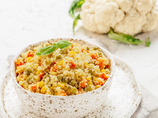 cauliflower rice with vegetables. copy space