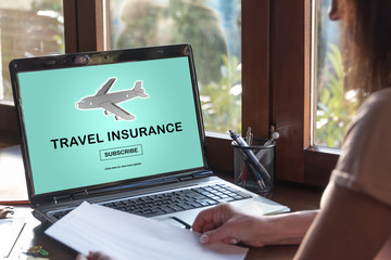 Travel insurance concept on a laptop screen