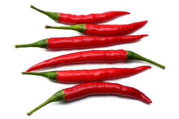 red hot chili peppers isolated on white background top view