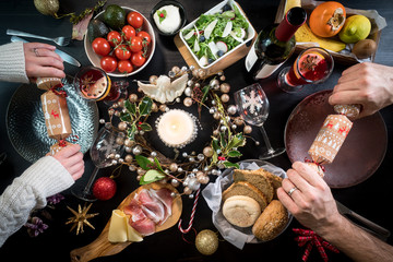 festive christmas table food hands celebration drink