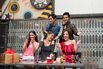 Happy time, Group of asia beautiful young people standing and celebrating together the party in the night club. Birthday,  New Year eve, corporate party, best friends