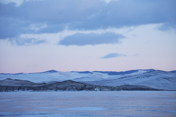 Lake Baikal, winter landscape. Sunset