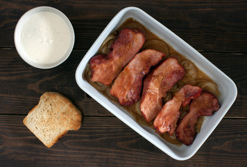 baked smoked pork with onion, toast and horseradish dip