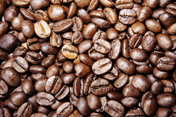 Close-up of roasted coffee beans. Full frame