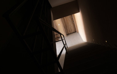 Naklejka premium Light on end of building coridor, view from above