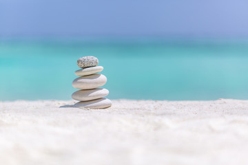 Inspirational nature background. Zen stones on beach background. Spa and well being  concept for health design