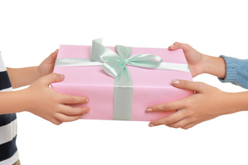 Young woman receiving Mother's Day gift from her little son on white background, closeup
